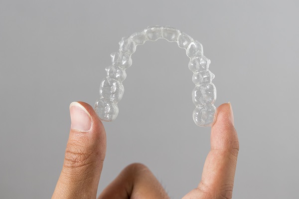 Will Invisible Braces Cause Pain?